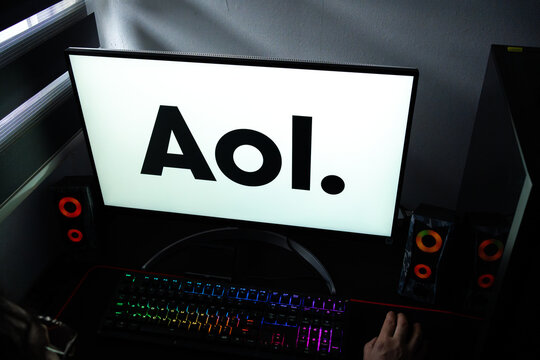 Punta Arenas, Chile &ndash; February 17, 2026: A person at a desk with the AOL corporate logo displayed on a computer monitor