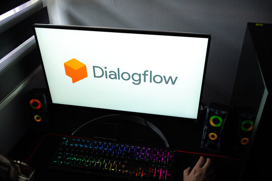 Punta Arenas, Chile &ndash; February 18, 2026: A person at a desk with the Google Dialogflow conversational AI logo displayed on a computer monitor