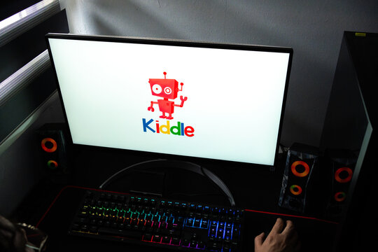 Punta Arenas, Chile &ndash; February 18, 2026: A person at a desk with the Kiddle safe search engine for kids logo displayed on a computer monitor