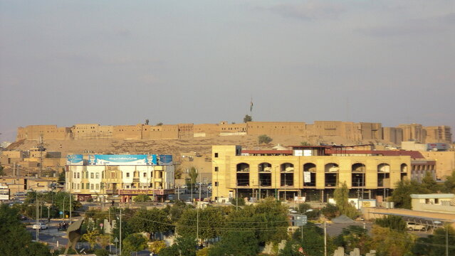 Overhead view of the Citadel of Erbil, Iraq, seen from a cable car in Minare Park, with the city in the foreground