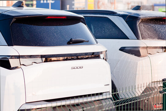 Riga, Latvia - January 24, 2026: The trunk lid of a Peugeot 3008 car on the street near a car center