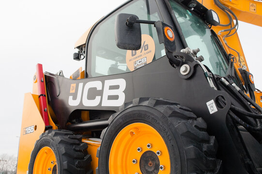 Riga, Latvia - February 8, 2026:A close-up of JTB construction equipment in winter