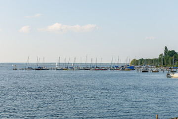 A large body of water with many boats floating on it