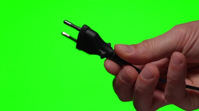 Connecting an electrical appliance to a power outlet.
Electrical plug for charging gadgets.
Electrical appliances powered by electricity.