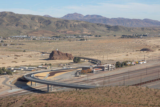 BARSTOW, CALIFORNIA, USA - Dec 20, 2025: The North First Avenue Bridge spans the railroad tracks near Barstow's train station
