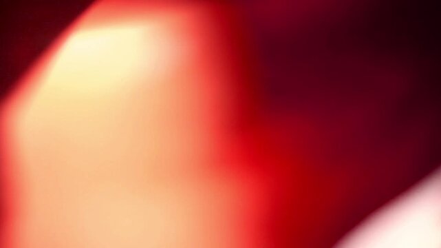 film burn transition with red and orange light leaks, ideal for editing effects.