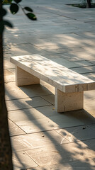 Minimalist stone bench with sunlight and shadows