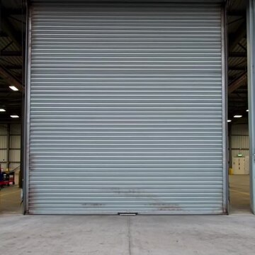 Closed industrial rolling shutter door