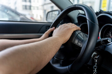 Fototapeta premium Driver Hand On Wheel
