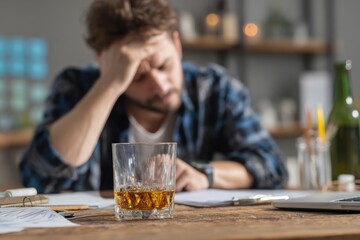 Alcohol as a Response to Job Loss and Financial Strain