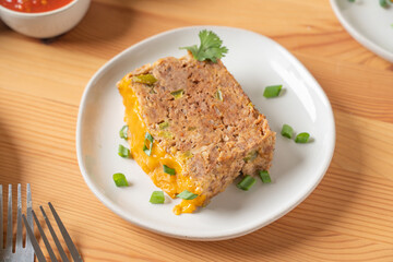 Retro dinner food. Cheesy meatloaf made with ground beef