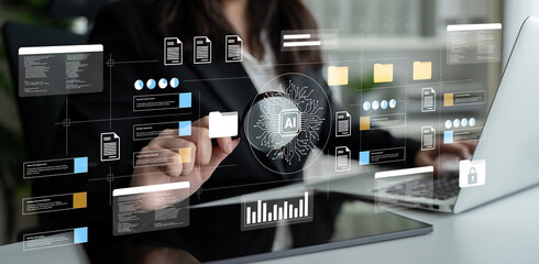 Plakat A professional interacts with a digital interface showcasing artificial intelligence data analysis in a contemporary office environment, emphasizing modern business processes. Gantry
