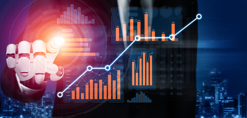 Robotic hand interacts with digital charts and graphs, illustrating business growth and data...