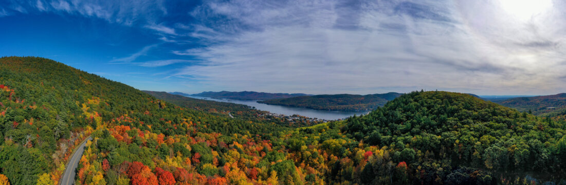 Panoramic Drone View of Lake George Adirondack Mountains During Peak Fall Foliage New York