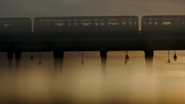Metro passing by on Paris Bir Hakeim Bridge