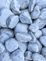 White natural stone pebbles texture background