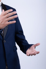 Obraz premium Person in formal attire on white background with professional concept