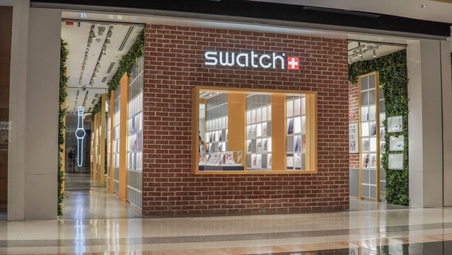 Swatch shop at Central World, Bangkok, Thailand, January 1st, 2016: Watch brand display and interior decoration at the store. Corner shop