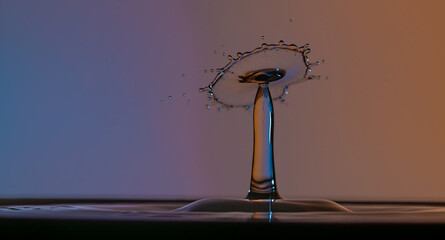 Color drops splash with umbrella or balls in fresh water