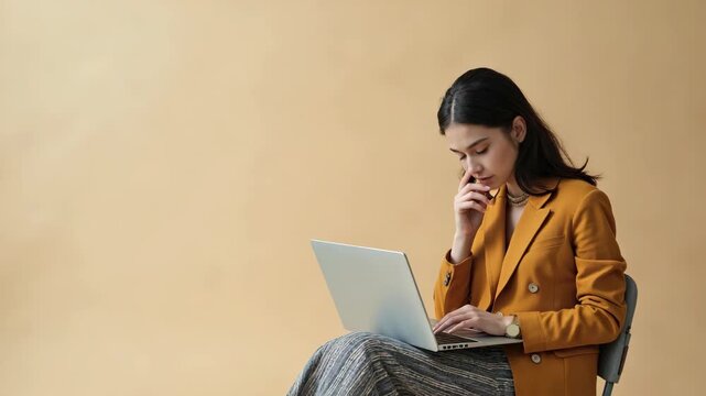 Creative composite shot collage illustration of thoughtful minded girl sit with laptop writing email isolated on beige color background fashion editorial shot, high-fashion imagery,.
