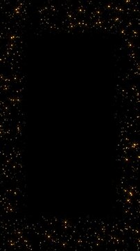 Elegant gold glitter and bokeh particle border in vertical format framing dark empty space, ideal overlay for premium product presentations, luxury brand announcements and awards