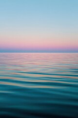 Obraz premium Calm water mirror in a vertical scene with gentle horizon and pastel hues