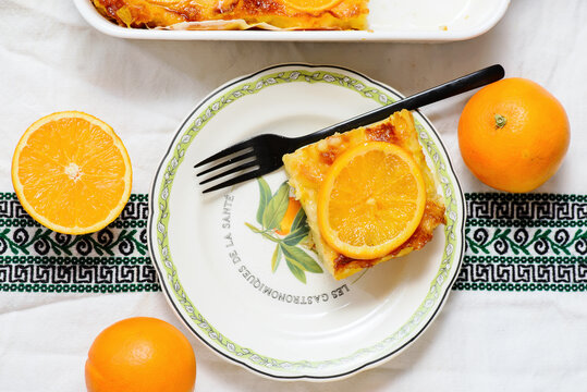 Traditional Greek filo pastry pie with oranges, Portokalopita..selective focus