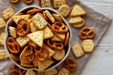 Naklejka premium Crunchy Cracker Snack Mix in a Bowl, top view.