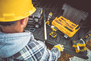 Working on a Project With Tools in a Pickup Truck © Tomasz Zajda
