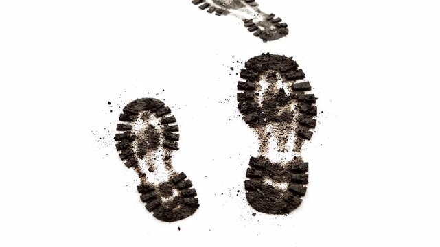 Dirty footprints from soil appearing one by one on a clean white background. Concept of investigation or environmental impact