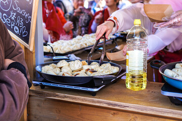 Steamed Baozi Buns At Street Stall With Woman In Traditional Chinese Dress