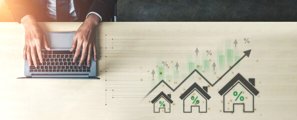 Concept of real estate investment and a rising housing market. The increase in property value is...