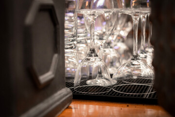 Wine Glasses Upside Down on Bar Counter &ndash; Elegant Restaurant and Hospitality Concept