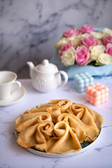 Delicious pancakes for breakfast with flowers