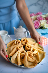 Delicious pancakes for breakfast with flowers