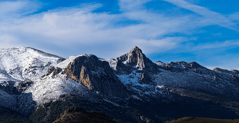 Obraz premium View of the snow-capped Sierra Arana mountains in Granada, Spain