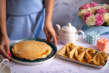 Delicious pancakes for breakfast with flowers