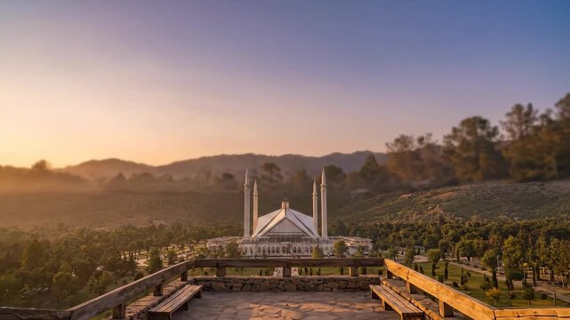 Faisal Mosque View Through Stone Arch at Sunset in Islamabad