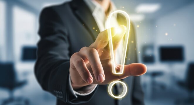 Business hand touching a virtual exclamation point to acknowledge a system alert.