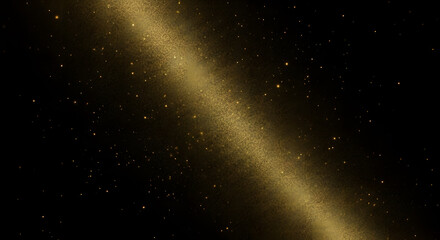 Obraz premium Abstract golden light streak against dark background with glittering particles
