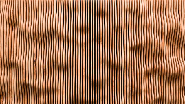 A parametric architectural surface features undulating vertical wood battens creating a fluid and organic rhythmic pattern. 3D rendered panel wall.