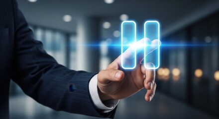 Businessman hand touching a floating pause icon to stop a video temporarily.