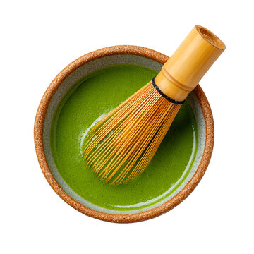 Matcha green tea liquid in ceramic bowl with bambo whisk for detox superfood, isolated cutout