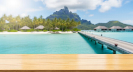 Obraz premium Empty wooden table foreground with blurred tropical island resort background