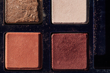 Fototapeta premium old eye shadow palette close up in neutrals 