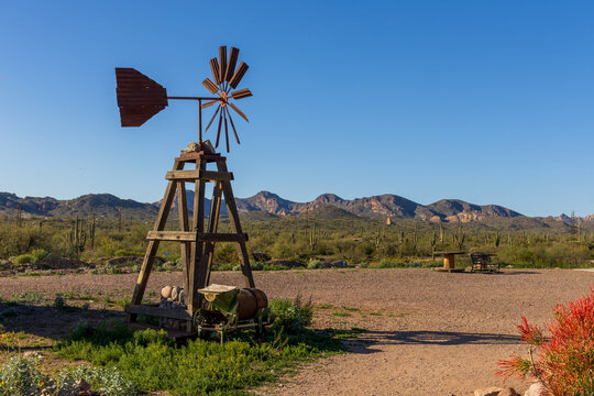 A vintage windmill in Goldfield, later Youngsberg, a gold mining town, now a ghost town in Pinal County, Arizona.