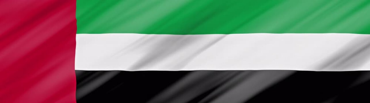 Realistic 3D animation of the United Arab Emirates national flag waving in the wind. Seamless video loop of the UAE symbol with detailed fabric texture