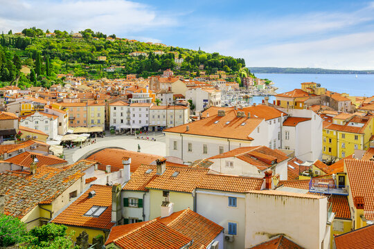 Hilltop scenic view of the coastal town of Piran Slovenia overlooking Tartini Square Tartinijev trg along the Adriatic Sea of the Istrian Peninsula.
