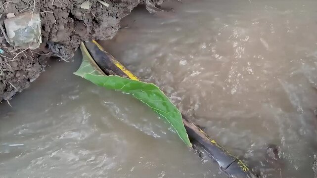 fast flowing small river water from upstream to downstream