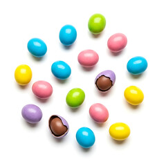 Candy coated chocolate eggs background Isolated on White background